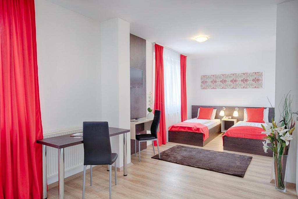 Двухместный (Небольшой двухместный номер с 1 кроватью или 2 отдельными кроватями) отеля Triple M Hotel, Будапешт