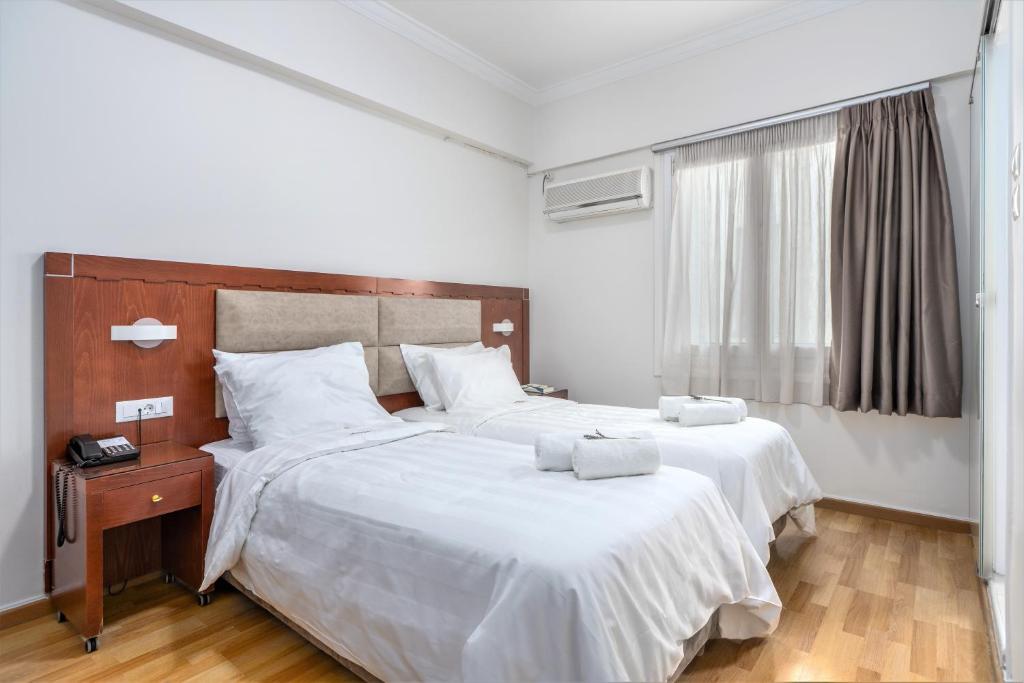 Двухместный (Двухместный номер эконом-класса с 1 кроватью или 2 отдельными кроватями) отеля Attalos Hotel, Афины