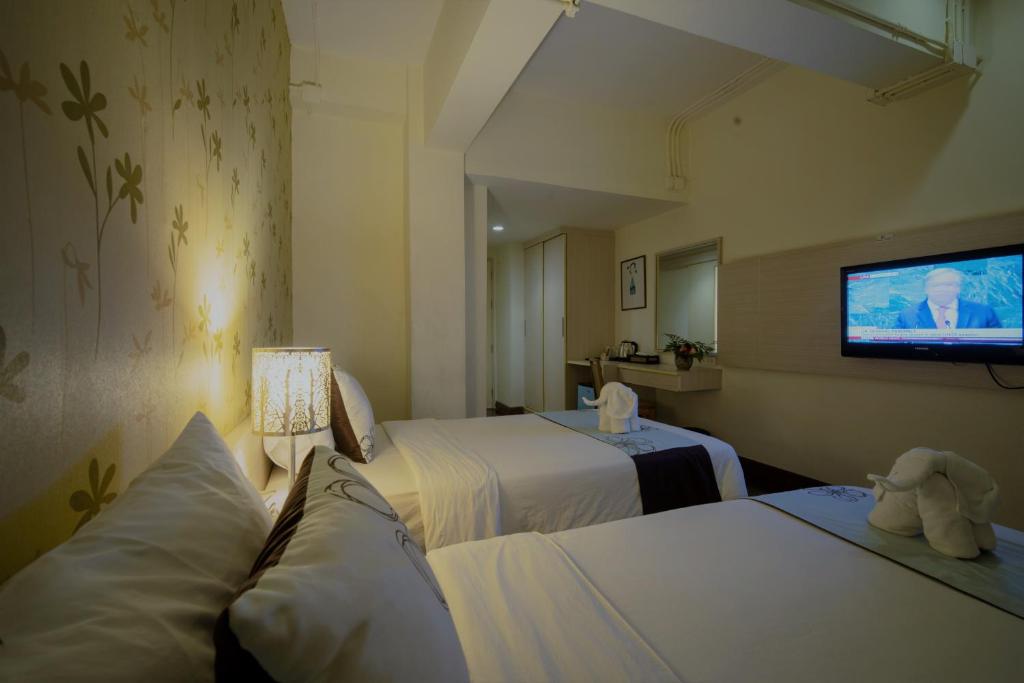 Двухместный (Улучшенный двухместный номер с 2 отдельными кроватями) отеля VILLA CHA CHA 2, Бангкок