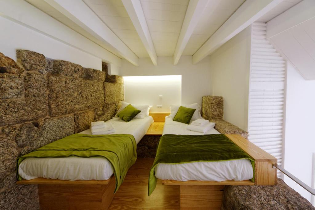 Апартаменты (Апартаменты с 2 спальнями (для 4 взрослых)) апартамента Guimarães Studios Lounge, Гимарайнш