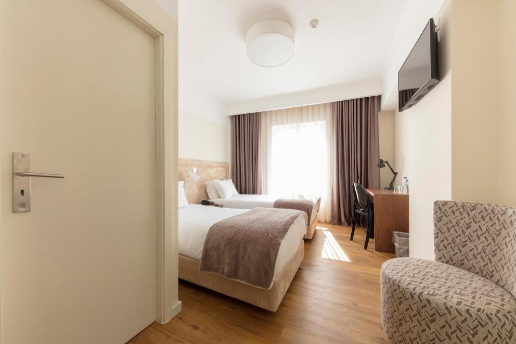Двухместный (Двухместный номер с 2 отдельными кроватями) отеля Hotel Porto Mar, Матозиньюш