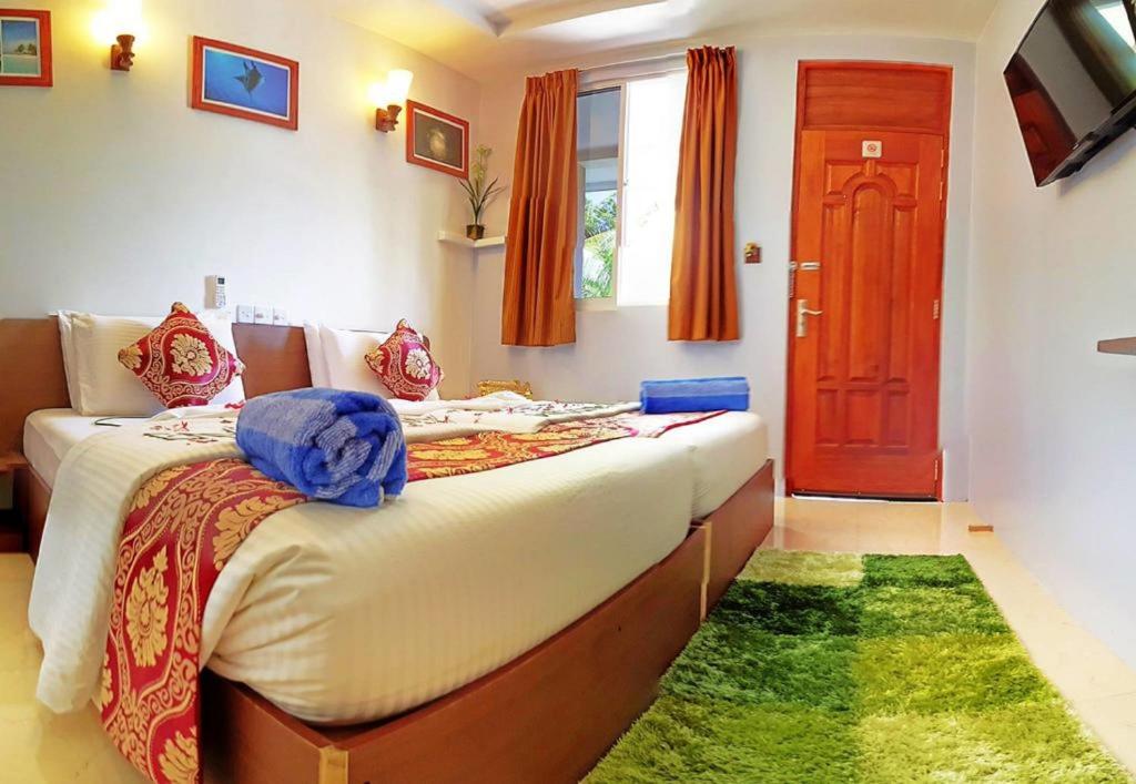 Двухместный (Двухместный номер Делюкс с 1 кроватью или 2 отдельными кроватями) гостевого дома Santa Rosa Maldives, Тулусду