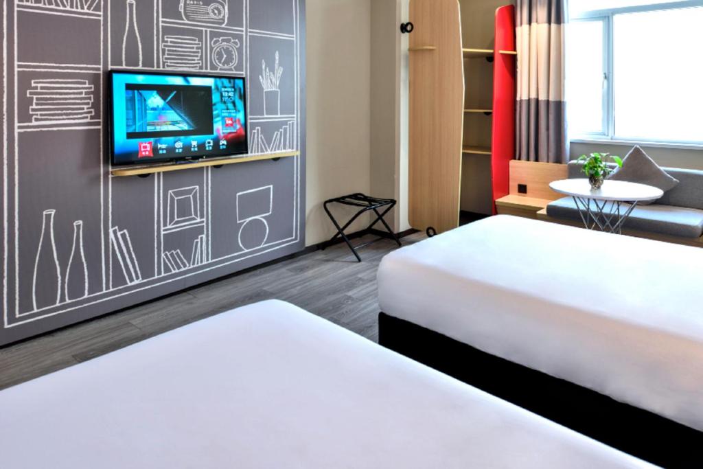 Двухместный (Двухместный номер бизнес-класса с 2 отдельными кроватями) отеля Ibis Shanghai New Hongqiao, Шанхай