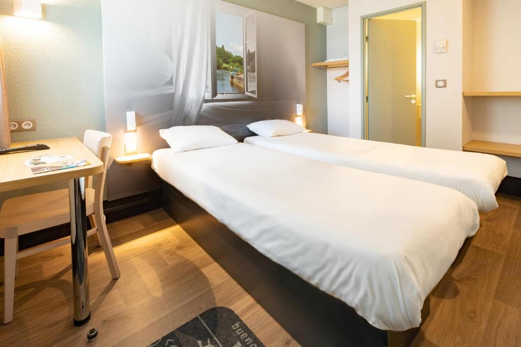 Двухместный (Двухместный номер с 2 отдельными кроватями) отеля B&B Hôtel Laval, Ле-Ман