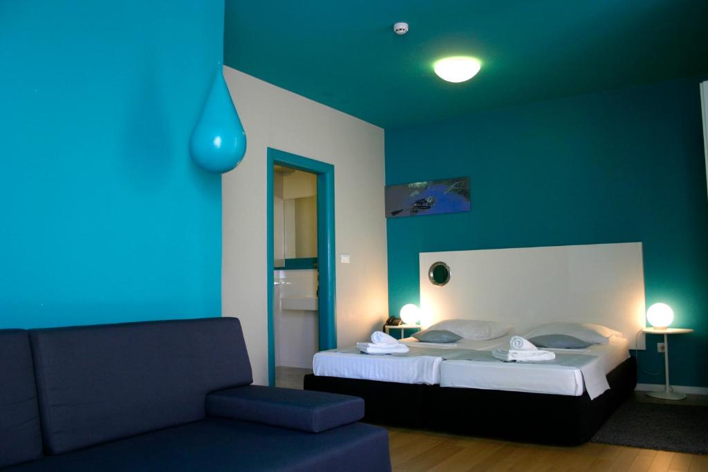 Двухместный (Улучшенный двухместный номер с 1 кроватью) апарт-отеля Apartments and Rooms Azzurra, Бол