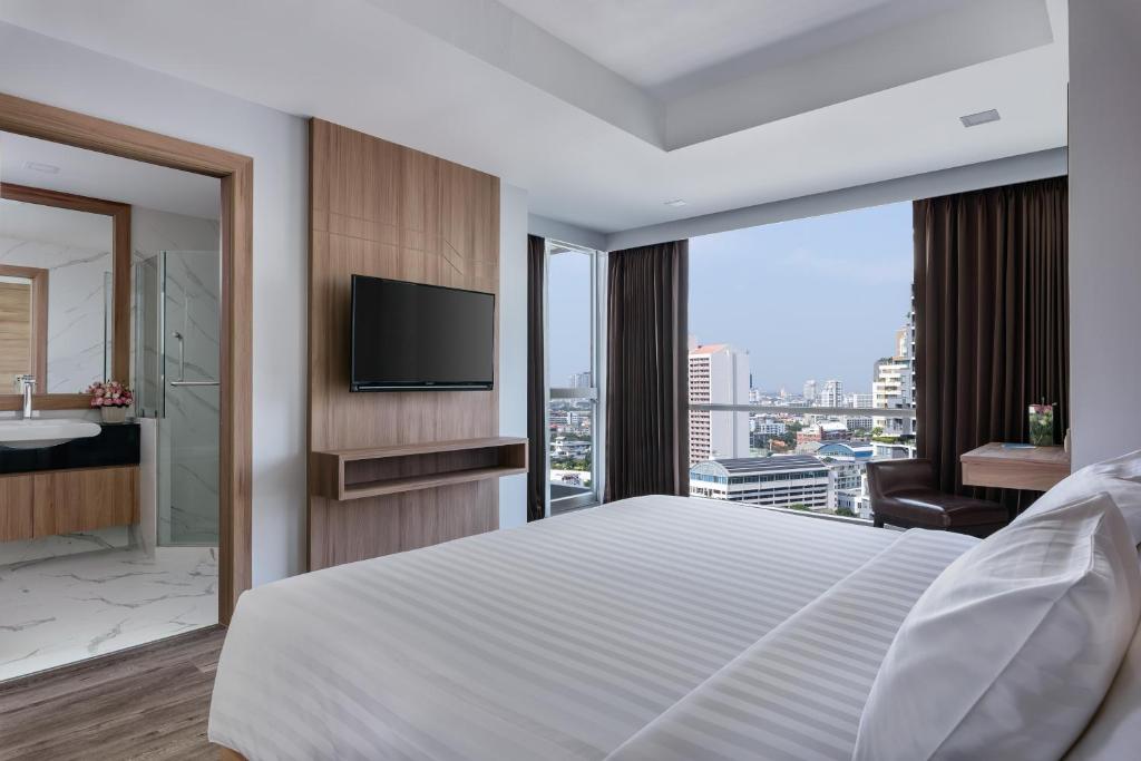 Сьюит (Представительский люкс с 1 спальней) отеля Adelphi Grande Sukhumvit by Compass Hospitality, Бангкок