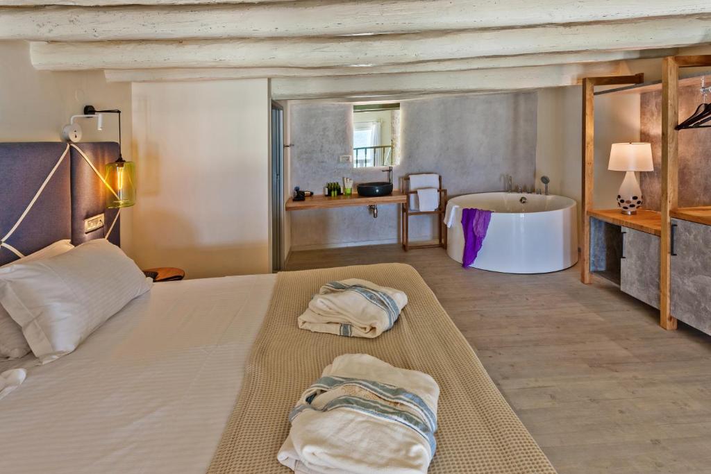 Сьюит (Представительский люкс с видом на море - двухуровневый) отеля Thalassa Boutique Hotel, Ретимно, Крит