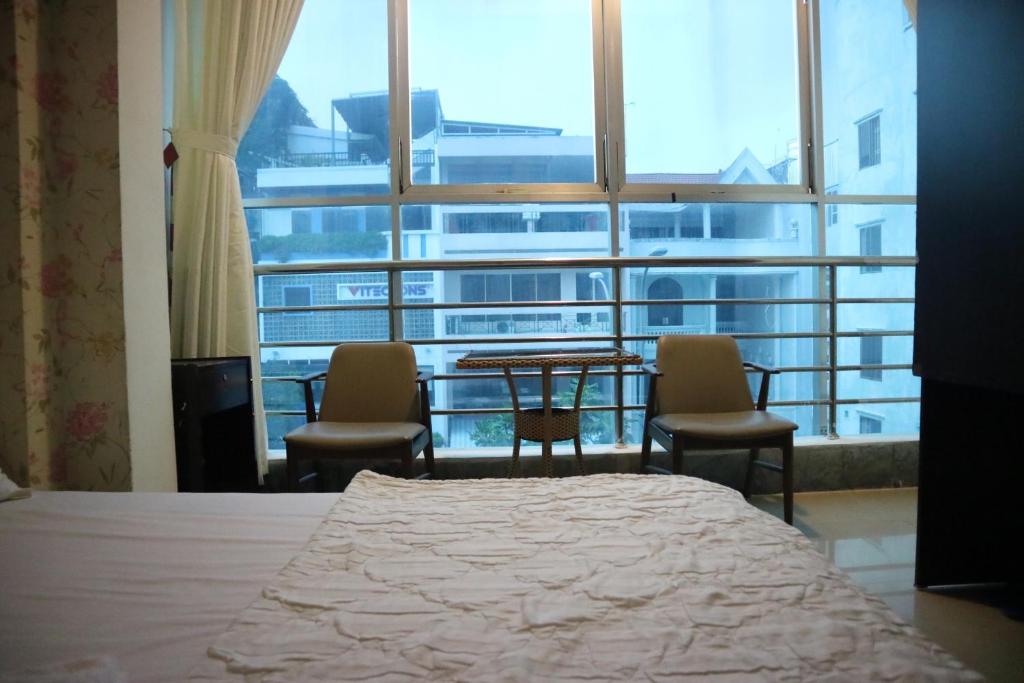 Двухместный (Номер с кроватью размера «queen-size») отеля Kim Long hotel, Хошимин