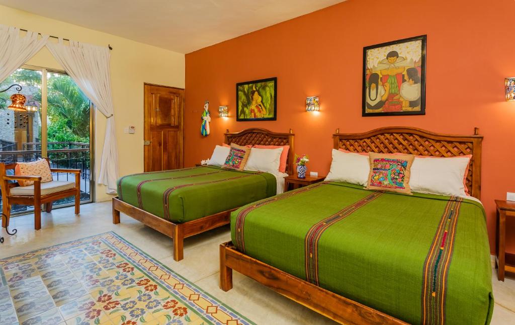 Четырехместный (Номер с 2 кроватями размера «queen-size») отеля Casa Del Maya Bed & Breakfast, Мерида