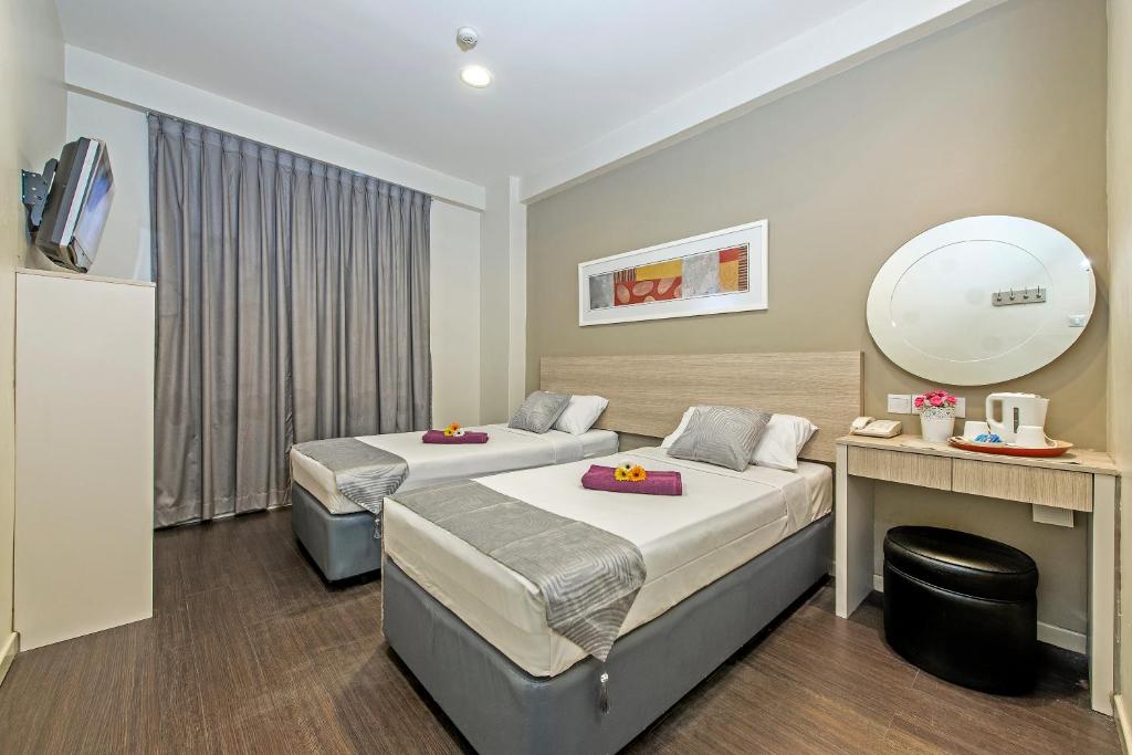 Двухместный (Специальное предложение - Стандартный двухместный номер с 2 отдельными кроватями) отеля Hotel 81 Lucky, Сингапур (город)