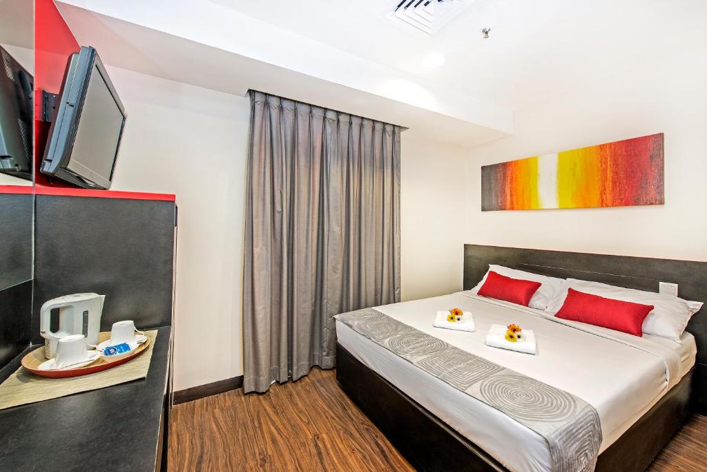 Двухместный (Улучшенный двухместный номер с 1 кроватью) отеля Hotel 81 Heritage, Сингапур (город)