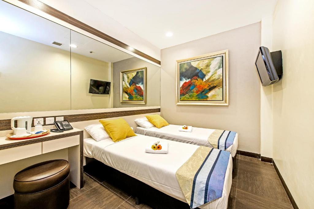 Двухместный (Двухместный номер с 2 отдельными кроватями (без окон)) отеля Hotel 81 Bugis, Сингапур (город)