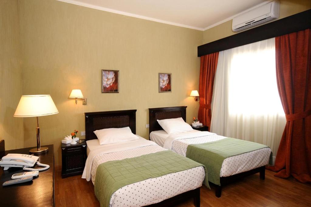 Двухместный (Специальное предложение - двухместный номер с 2 отдельными кроватями - только для граждан Египта) отеля Green Plaza Inn, Александрия