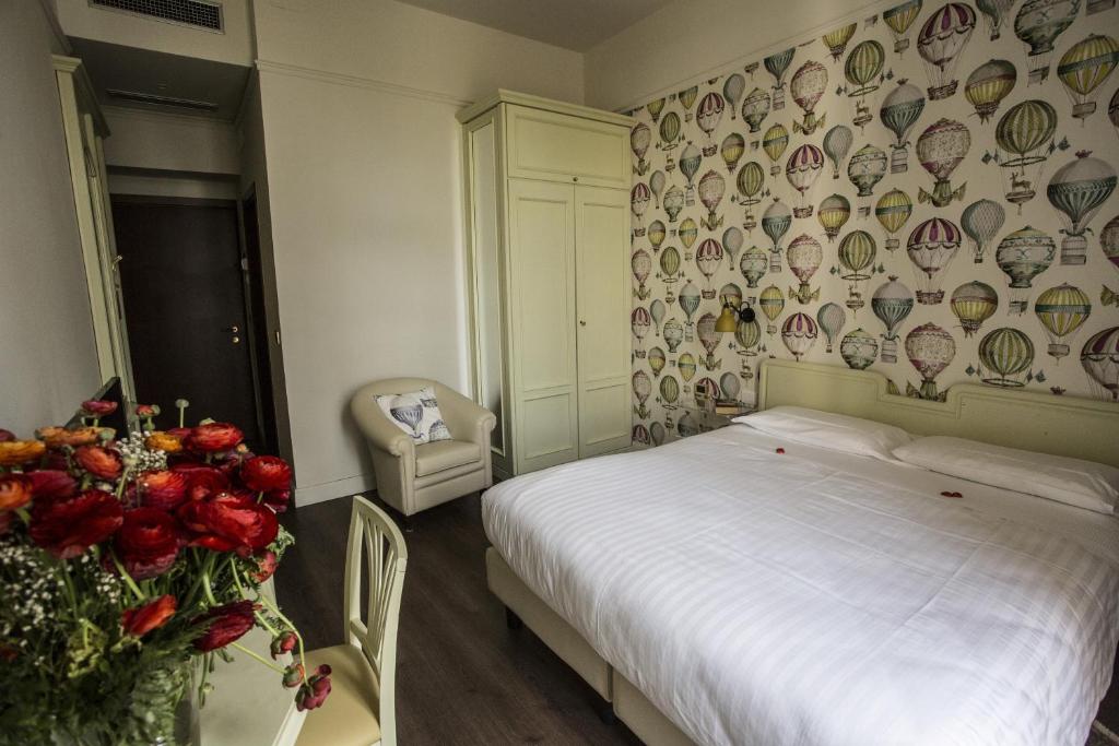 Двухместный (Двухместный номер с 1 кроватью или 2 отдельными кроватями и боковым видом на море) отеля Lolli Palace Hotel, Сан-Ремо