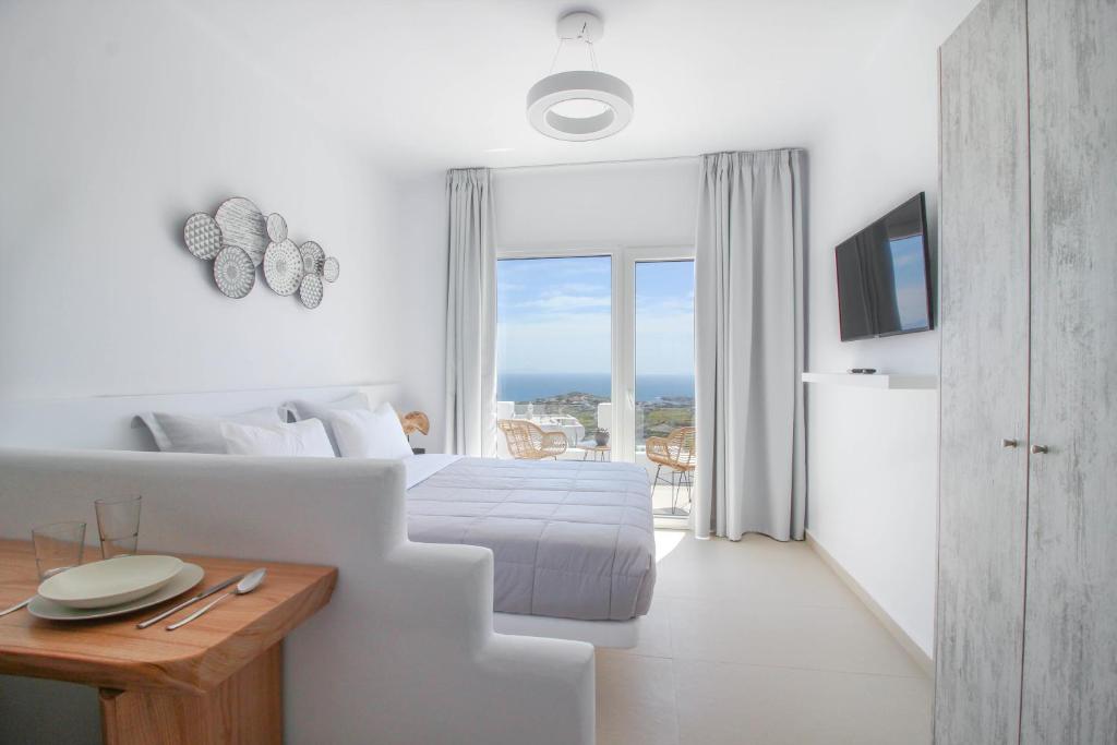 Сьюит (Люкс для новобрачных с видом на море) апарт-отеля Sea & Stone Residence, Платис Ялос, Эгейские острова