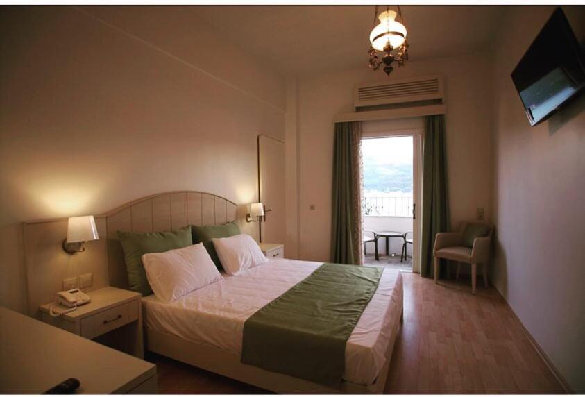 Двухместный (Двухместный номер с 1 кроватью или 2 отдельными кроватями - Рядом с морем, 3 этаж) отеля Mirini Hotel, Самос
