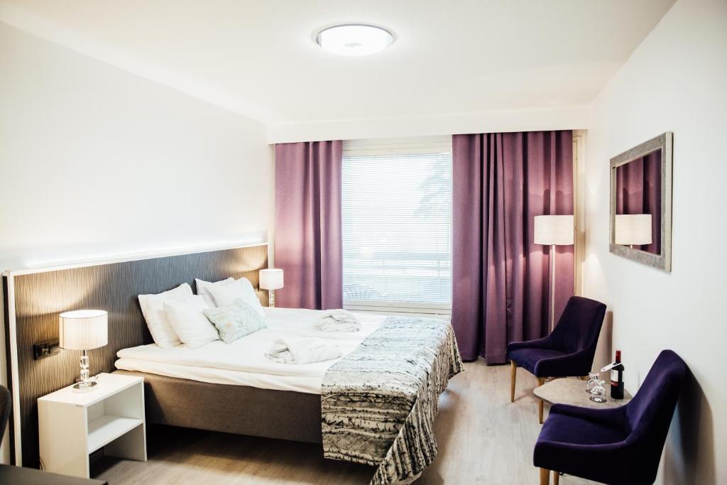 Двухместный (Улучшенный двухместный номер с 1 кроватью или 2 отдельными кроватями и посещением спа-салона) отеля Spa Hotel Kunnonpaikka, Куопио