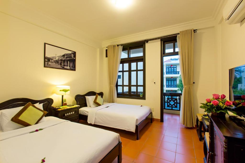 Двухместный (Улучшенный двухместный номер с 2 отдельными кроватями) курортного отеля Phu Thinh Boutique Resort & Spa, Хойан