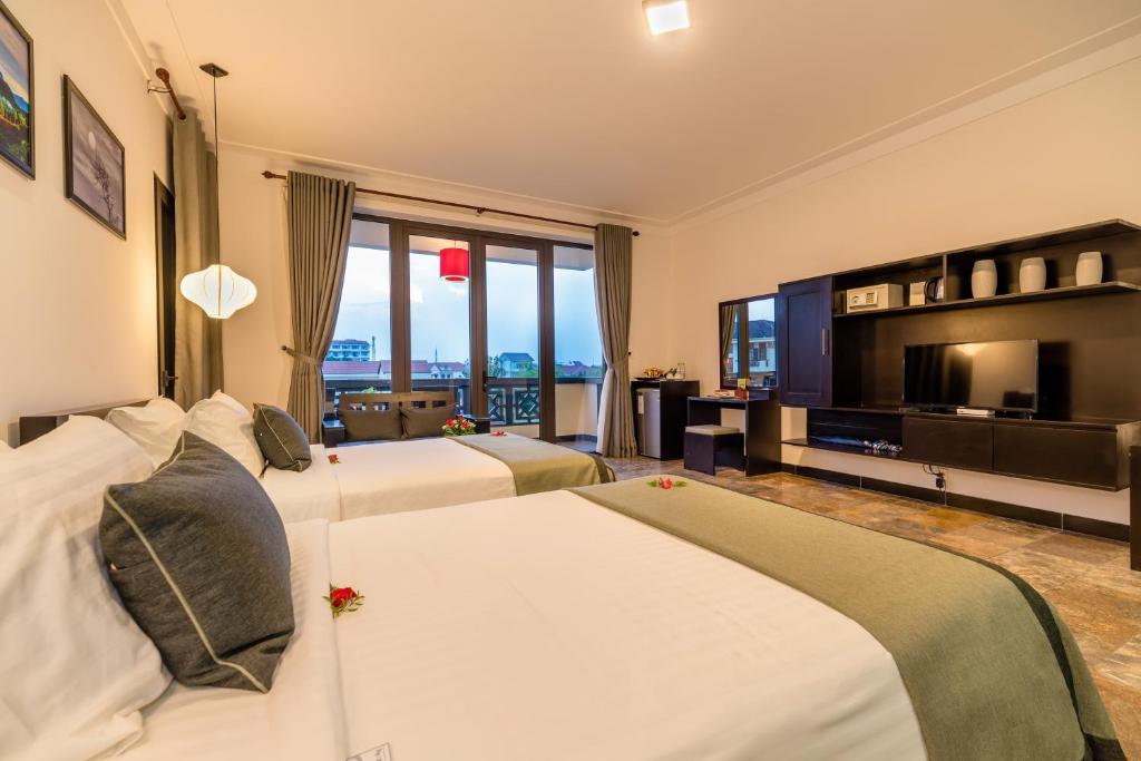 Сьюит (Двухместный полулюкс с 2 отдельными кроватями и видом на сад) курортного отеля Phu Thinh Boutique Resort & Spa, Хойан