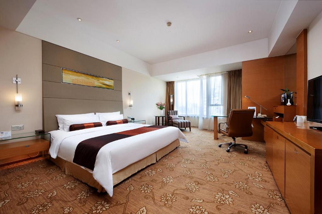 Двухместный (Номер Делюкс с кроватью размера «king-size») отеля Jinling Hotel Wuxi, Уси