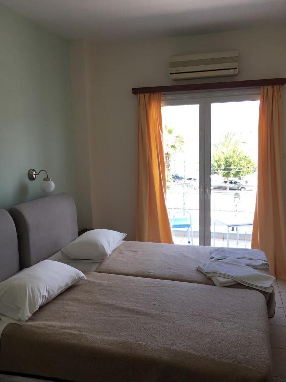 Двухместный (Двухместный номер с 1 кроватью или 2 отдельными кроватями и боковым видом на море) отеля Hotel Papasotiriou, Галатас