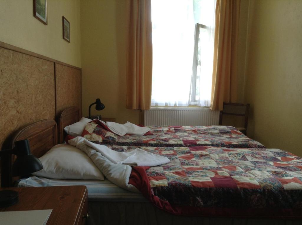 Двухместный (Двухместный номер с 2 отдельными кроватями и собственной ванной комнатой) гостевого дома Kastani Home Accommodation, Тарту