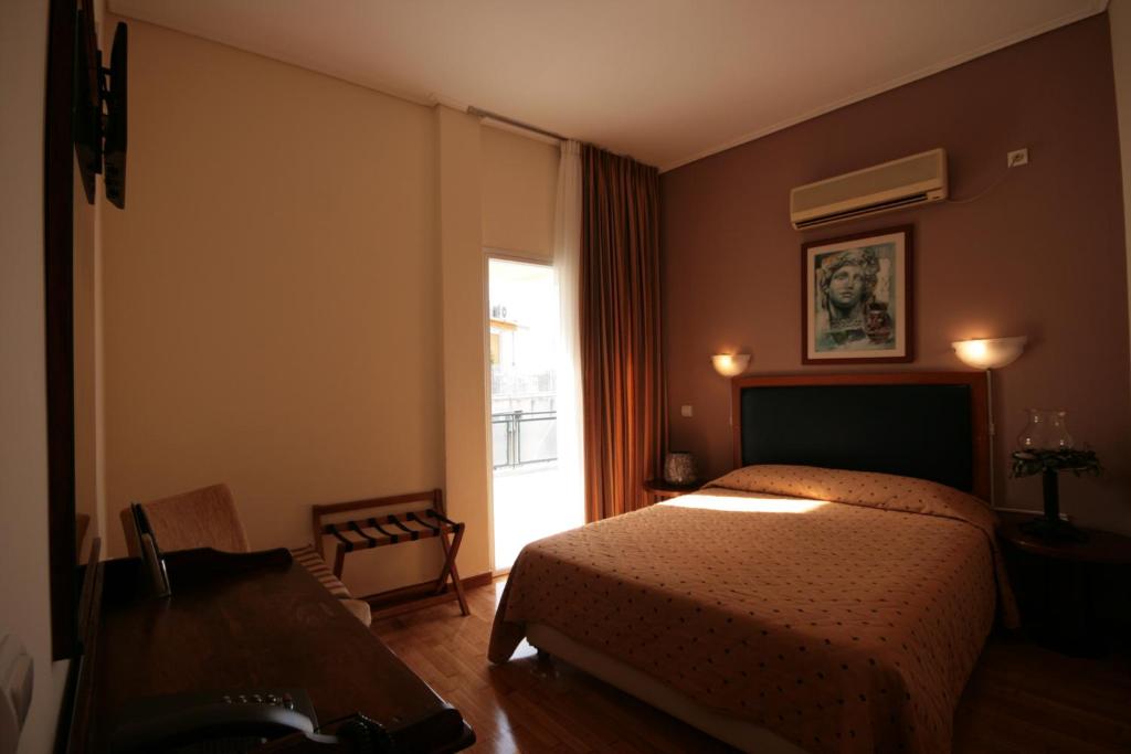 Двухместный (Двухместный номер с видом на Акрополь и 1 кроватью/2 отдельными кроватями) отеля Adam's Hotel, Афины