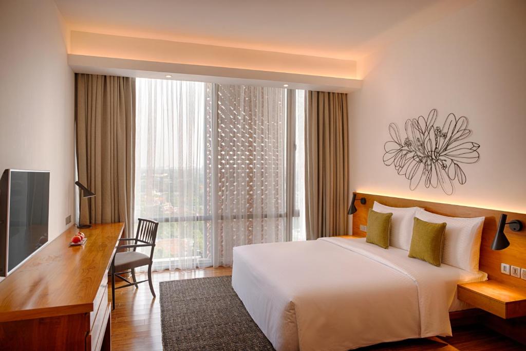 Двухместный (Длительное предложение на выходные - Двухместный номер Делюкс с 1 кроватью, скидка 15% на спа-процедуры (стандартное меню) и мини-бар) отеля Jetwing Colombo Seven, Коломбо