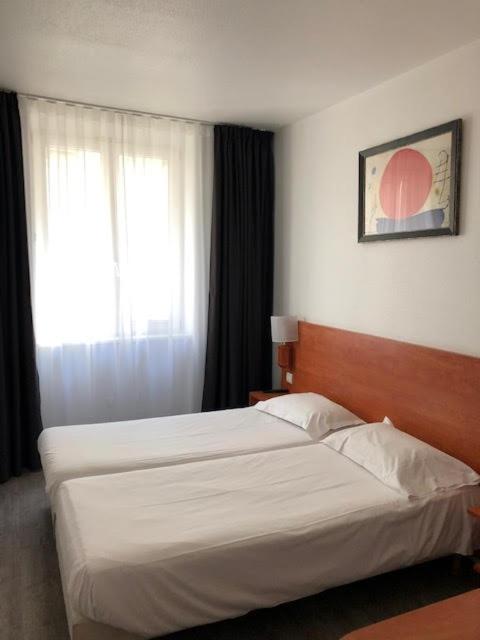 Двухместный (Двухместный номер с 2 отдельными кроватями) отеля Hotel Le 21ème, Страсбург