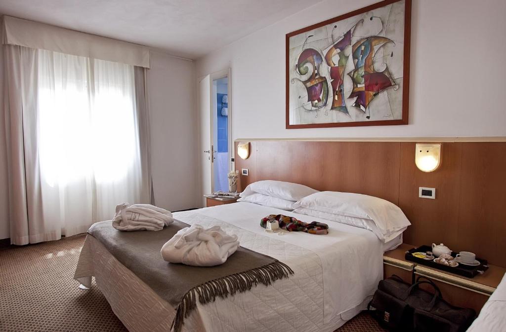 Двухместный (Стандартный двухместный номер с 1 кроватью или 2 отдельными кроватями) отеля Hotel Principe di Piemonte, Римини