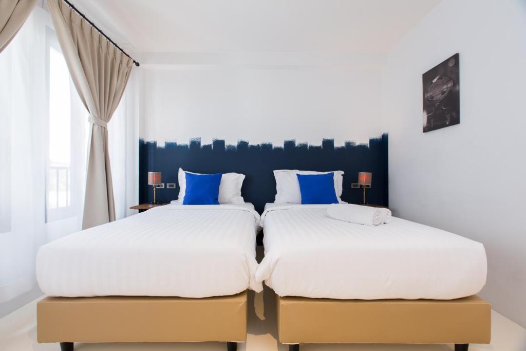Двухместный (Двухместный номер Делюкс с 2 отдельными кроватями) отеля Xinlor House, Пхукет