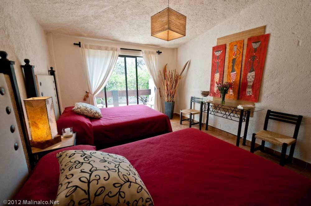 Двухместный (Двухместный номер с 2 двуспальными кроватями) отеля Hotel Casa de Campo Malinalco, Малиналько