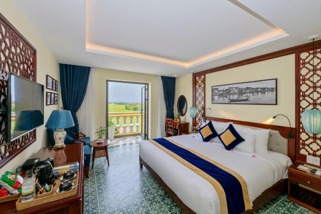 Двухместный (Deluxe Double Room with Rice Field Balcony) отеля Le Pavillon Hoi An Boutique Hotel & Spa, Хойан
