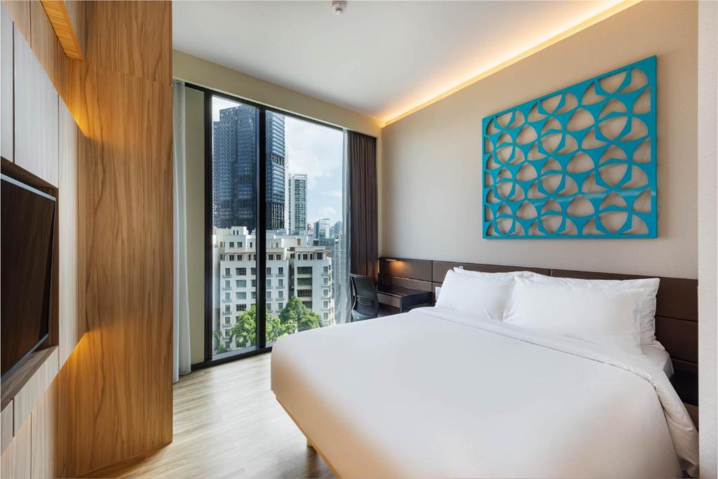 Двухместный (Привилегированный двухместный номер с 1 кроватью) отеля Mercure Singapore On Stevens, Сингапур (город)
