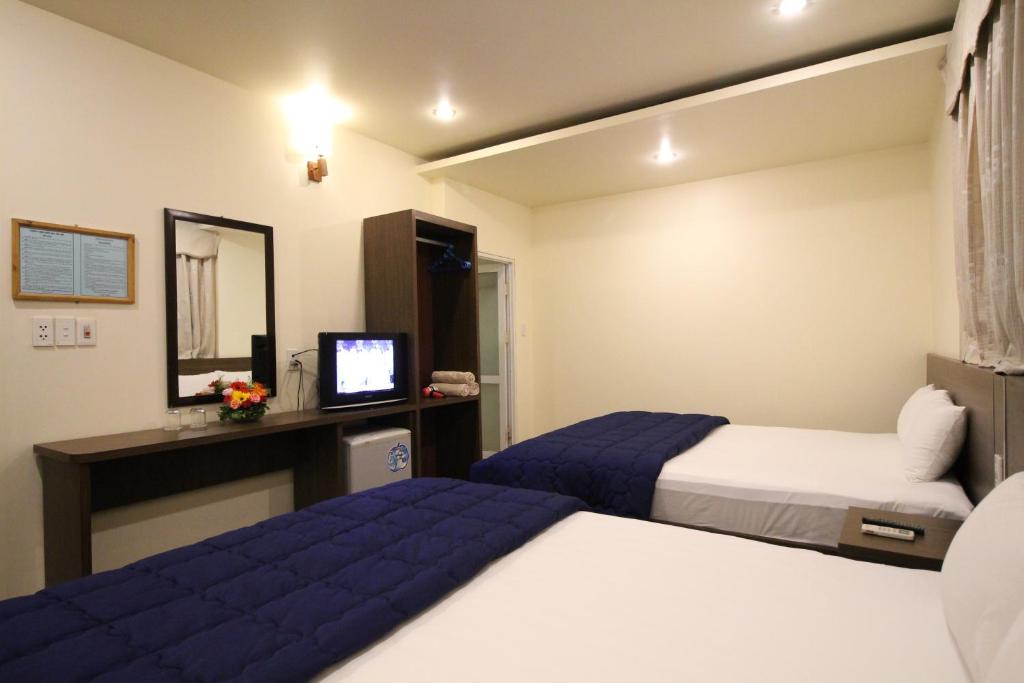 Четырехместный (Стандартный четырехместный номер) отеля Catba Dream Hotel, Катба