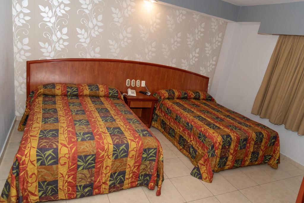 Двухместный (Двухместный номер с 2 отдельными кроватями) отеля Hotel Impala, Веракрус