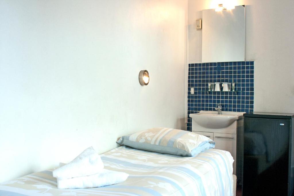 Одноместный (Одноместный номер с общей ванной комнатой) отеля Hotel Torenzicht, Амстердам