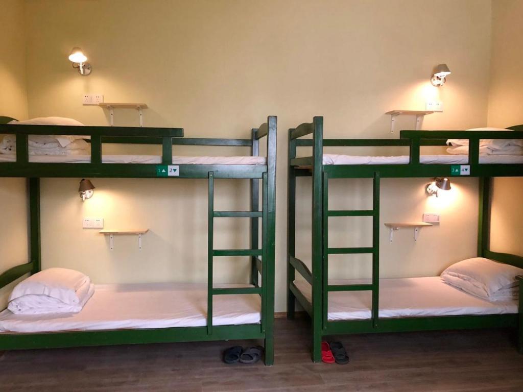 Номер (Кровать в общем номере для мужчин с 3 кроватями и общей ванной комнатой) хостела Wushanyi International Youth Hostel, Ханчжоу