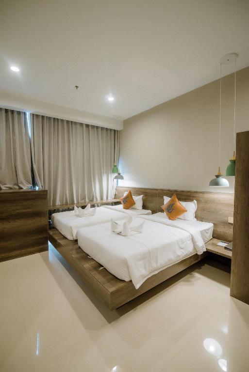 Двухместный (Улучшенный двухместный номер с 2 отдельными кроватями) отеля Wooden Maple Hotel, Пномпень