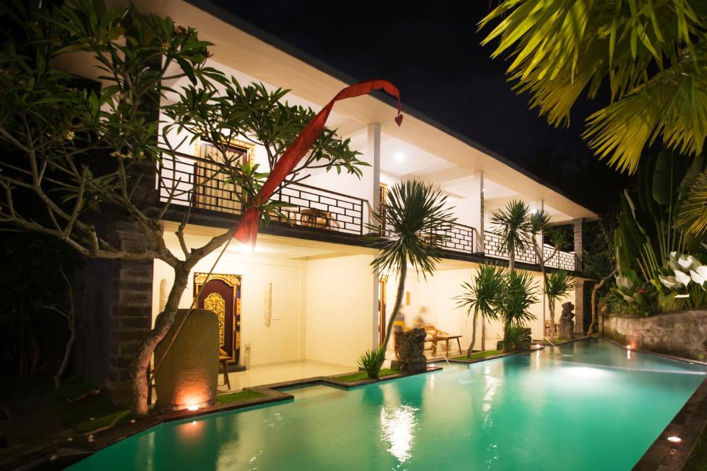 Двухместный (Двухместный номер Делюкс с 1 кроватью или 2 отдельными кроватями и видом на бассейн) виллы Asri Sari Resort, Убуд