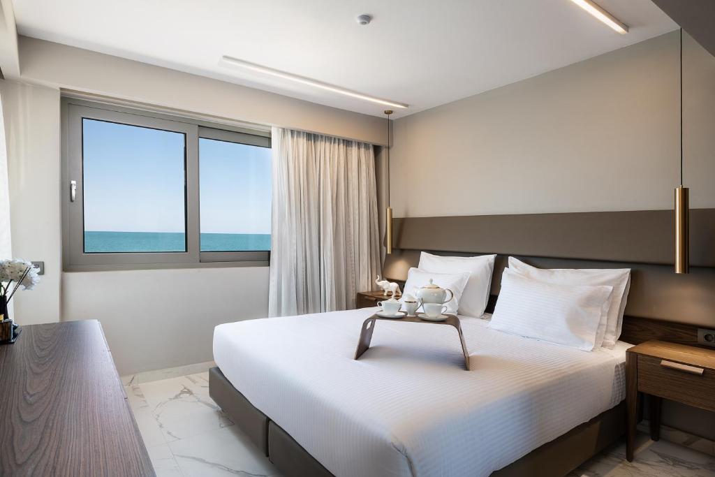 Сьюит (Люкс с видом на море (для 4 взрослых)) отеля Menia Beach Hotel, Платаниас