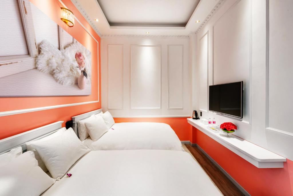Двухместный (Улучшенный двухместный номер с 2 отдельными кроватями) отеля Dalat Boutique Hotel, Далат