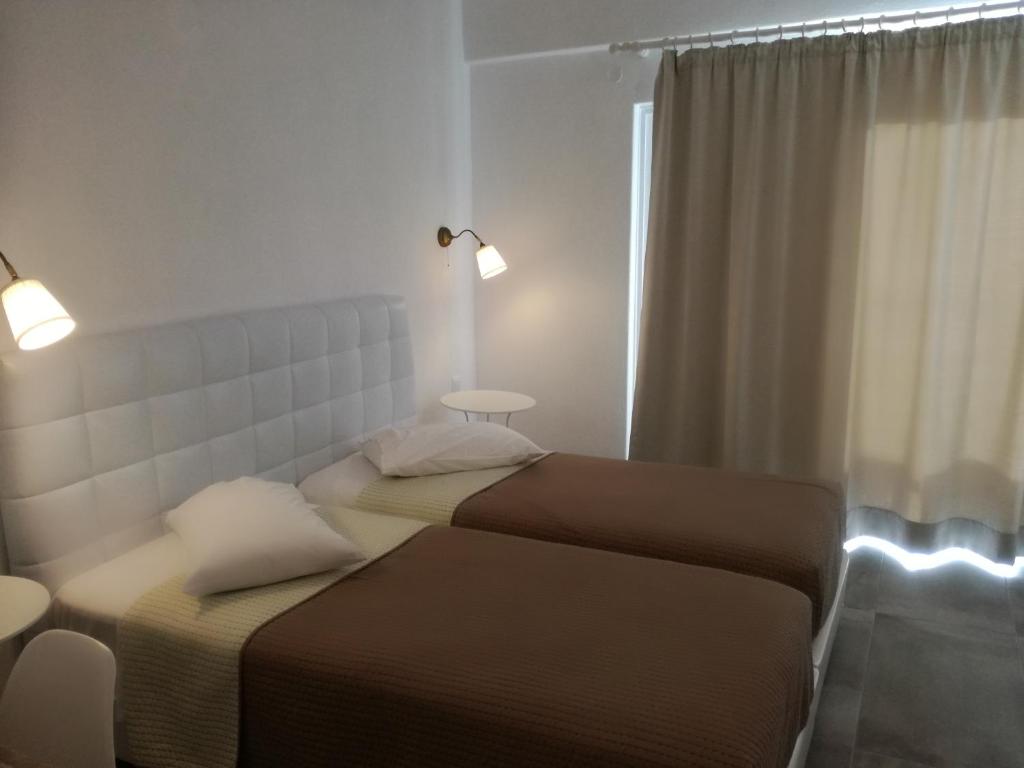 Двухместный (Улучшенный двухместный номер с 1 кроватью или 2 отдельными кроватями и террасой) отеля Iliada Hotel, Периволос