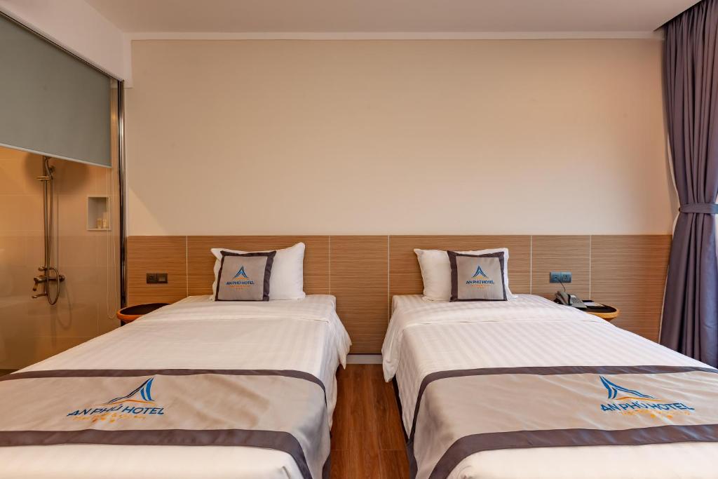 Двухместный (Улучшенный двухместный номер с 1 кроватью или 2 отдельными кроватями) отеля An Phu Hotel, Дуонг-Донг