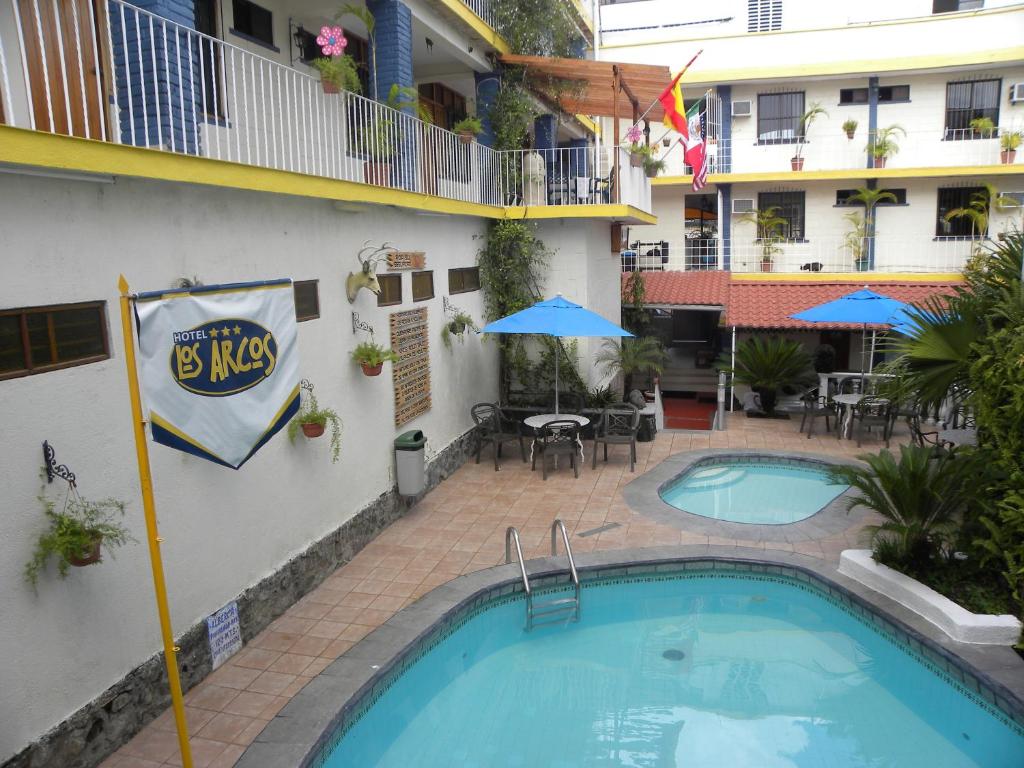 Отель Hotel EMS Los Arcos, Катемако