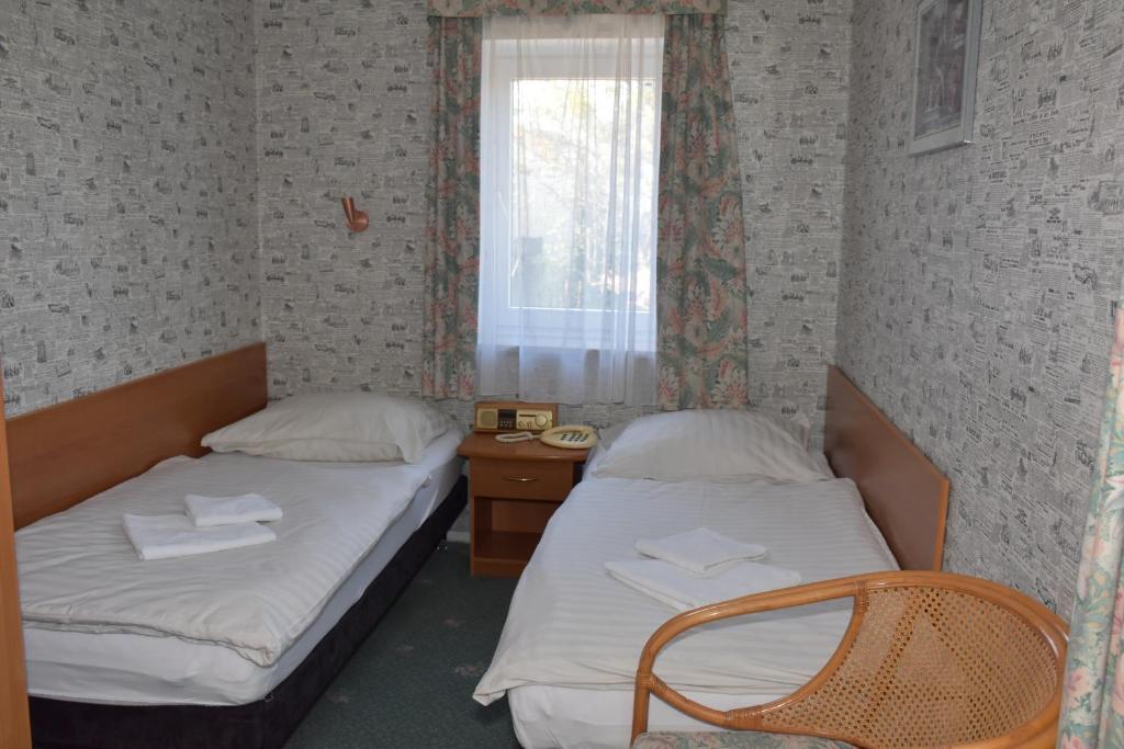 Двухместный (Двухместный номер с 2 отдельными кроватями и собственной ванной комнатой) апарт-отеля Montemarco, Варшава