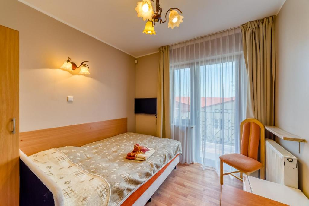 Двухместный (Небольшой двухместный номер с 1 кроватью) семейного отеля Willa Joker, Крыница-Морска