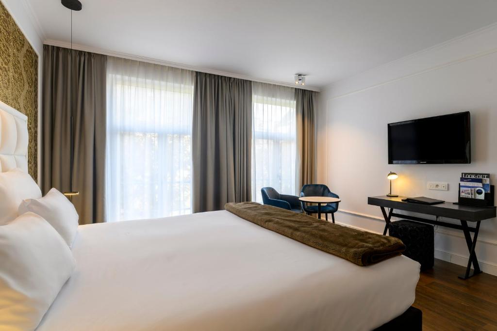 Двухместный (Двухместный номер Делюкс с 1 кроватью и террасой) отеля Hotel Rubens-Grote Markt, Антверпен