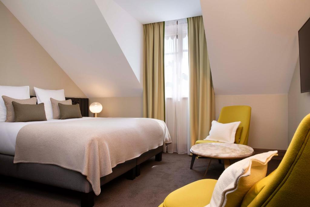 Двухместный (Представительский двухместный номер с 1 кроватью) отеля Hotel D Geneva, Женева