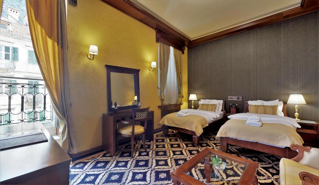 Двухместный (Двухместный номер Делюкс с 1 кроватью или 2 отдельными кроватями) отеля Historic Boutique Hotel Cattaro, Котор
